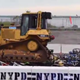 Image for article titled NYPD Assholes Just Publicly Executed A Bunch Of Motorcycles With A Bulldozer On Facebook
